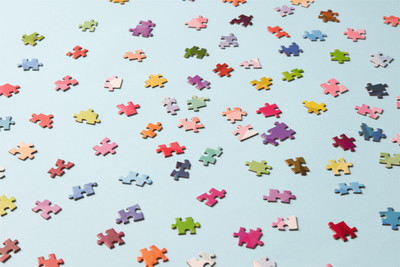 jigsaw puzzle pieces blue background